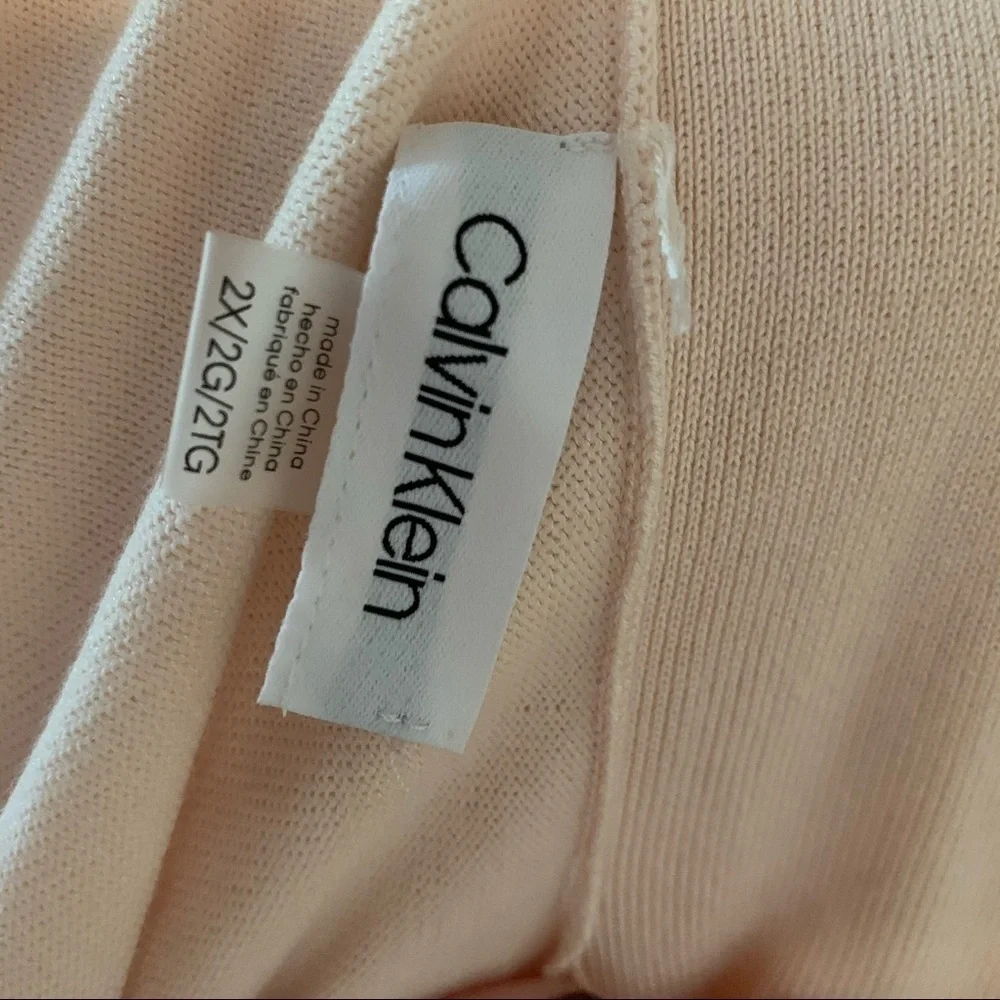 Calvin Klein NWT shrug light peach color